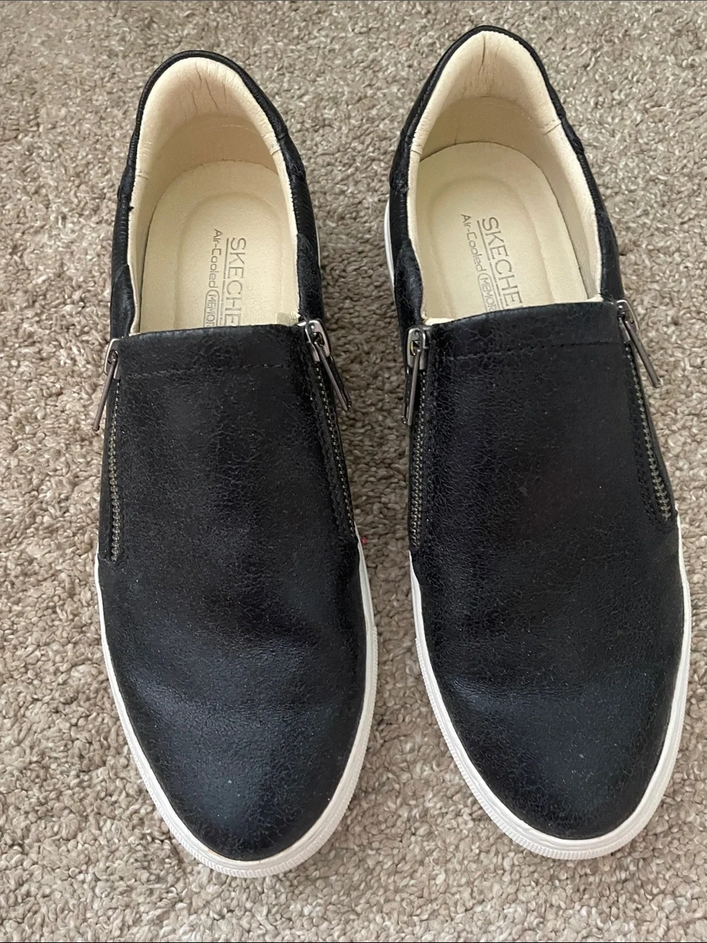 Skechers Black Slip-On Athletic Shoes with White Soles